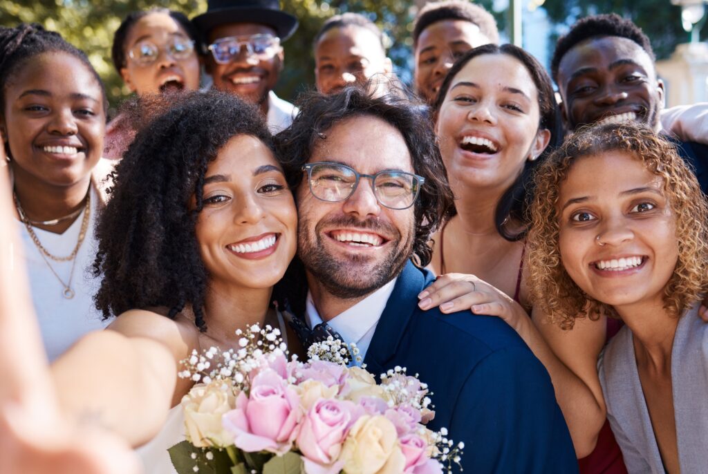 Wedding, selfie and happy friends and family celebrating love of groom and bride at a ceremony or e